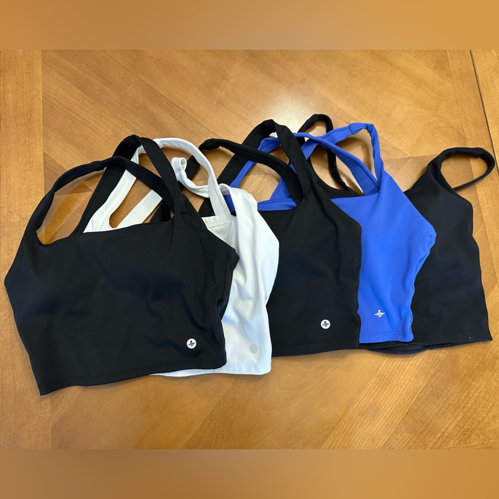 Xs halara tops, 3 black, 1 white, 1 blue